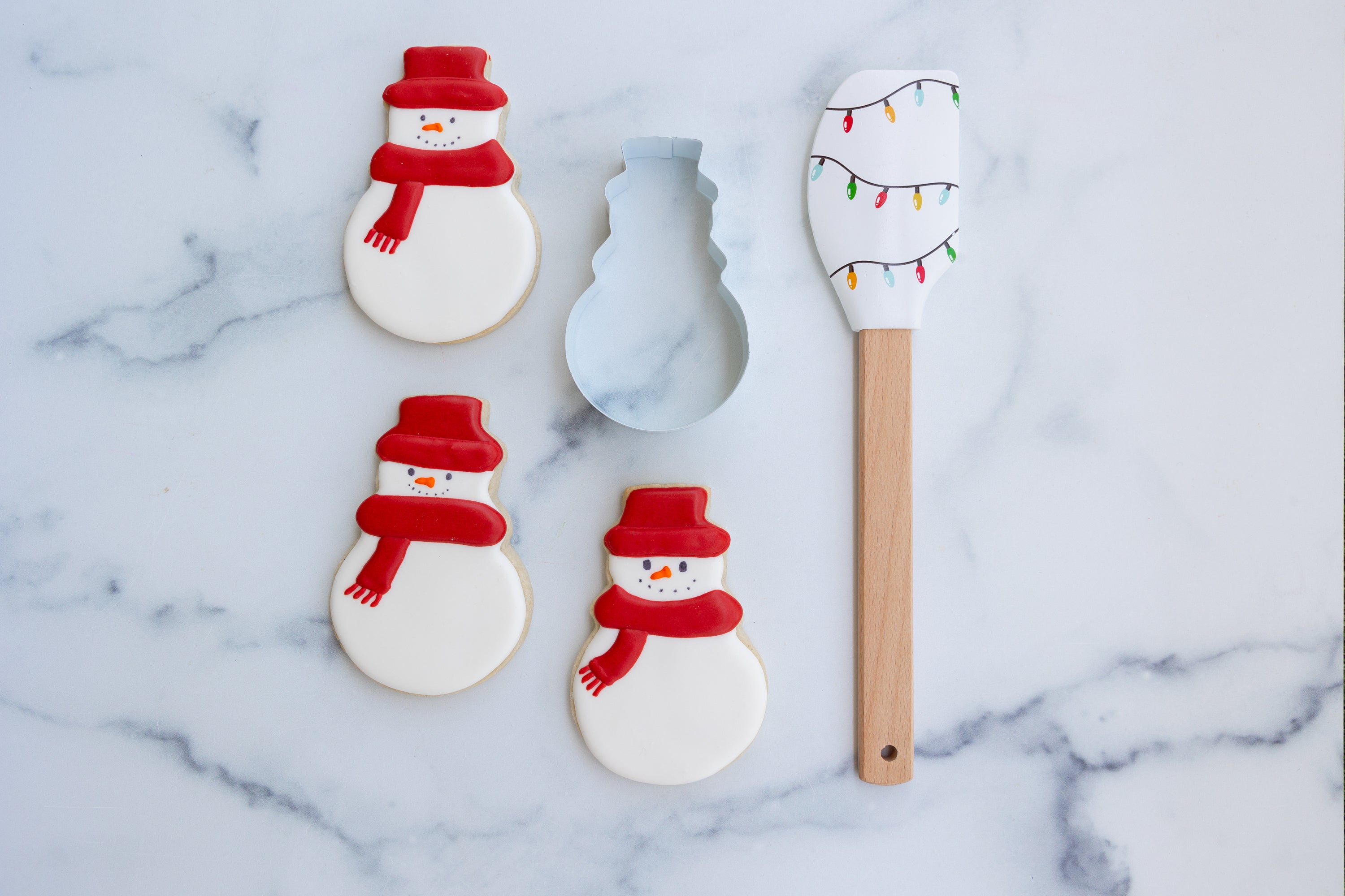 Lifestyle image of decorated snowmen cookies