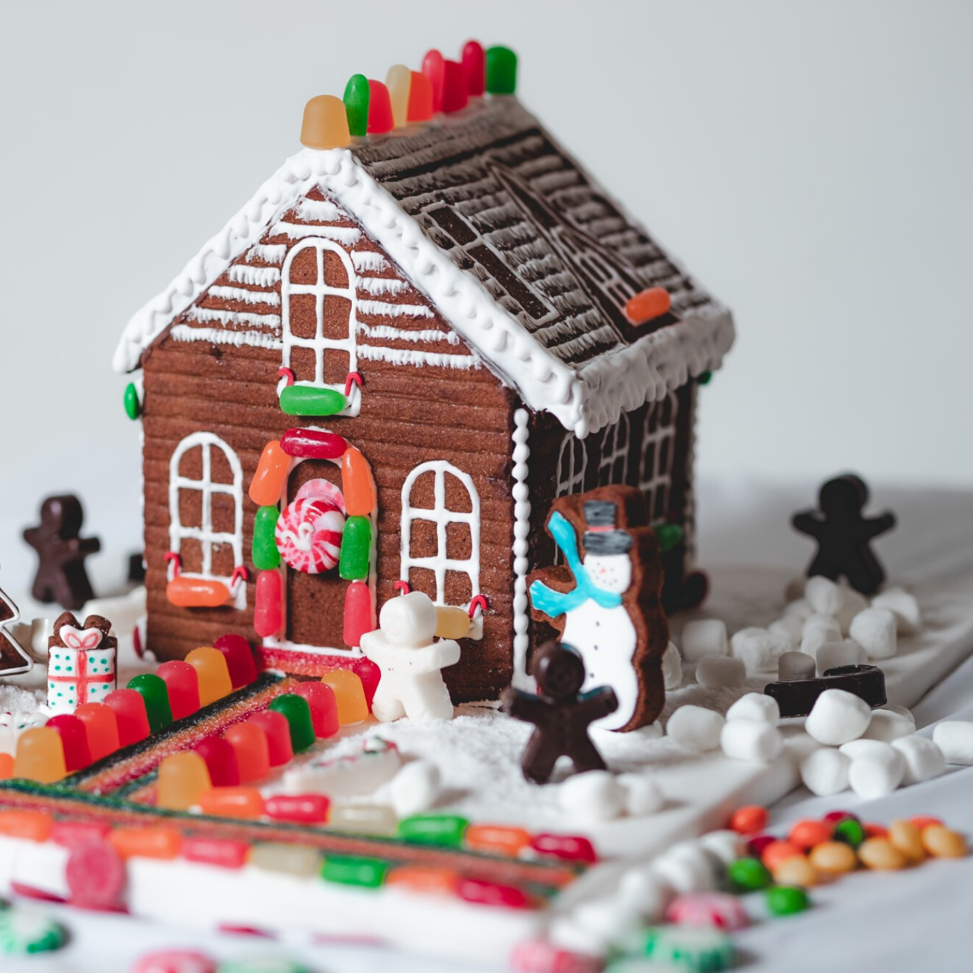 Lifestyle image of fully decorated Gingerbread house
