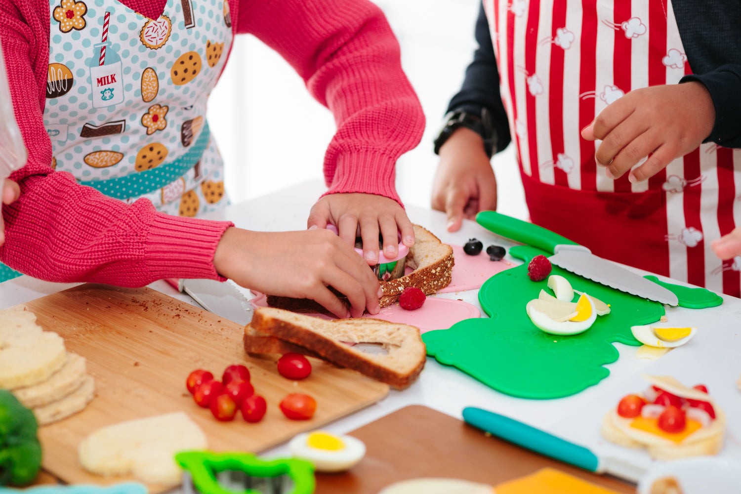 Lifestyle image of kids making sandwiches