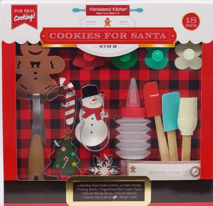 Boxed image of Cookie for Santa which shows that it includes 4 stainless steel cookie cutters, 4 cookie stamps, 1 frosting bottle with tip and cap, 1 gingerbread man cookie flipper, 1 silicone mixing spoon, 1 silicone spatula, 1 silicone pastry brush and recipes.