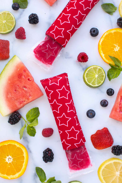 Lifestyle image of berry flavored popsicles  