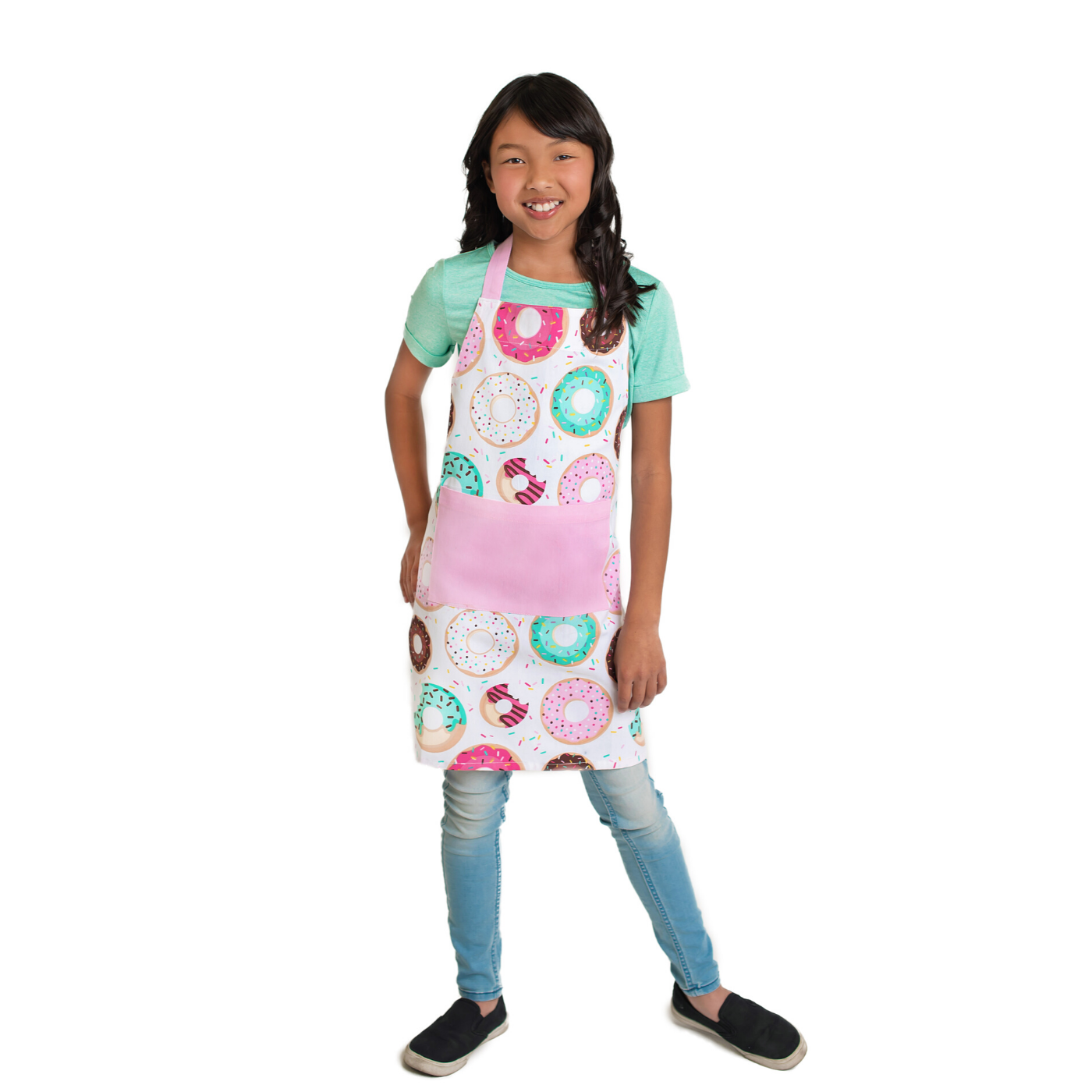 Child wearing child sized apron from Donut Print Adult and Child Apron Cooking Set