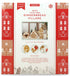 In box image of Make Your Own Gingerbread Village including: 17 Stainless Steel Cookie Cutters to Make  Cottages, Townhouses, Chalets and Gingerbread Men,  7 Decorative Stencils, 1 Frosting Scraper, 2 Reusable  Frosting Bags, 2 Frosting Couplers with Rings and 2  Stainless Steel Frosting Tips, along with Recipes and Instructions