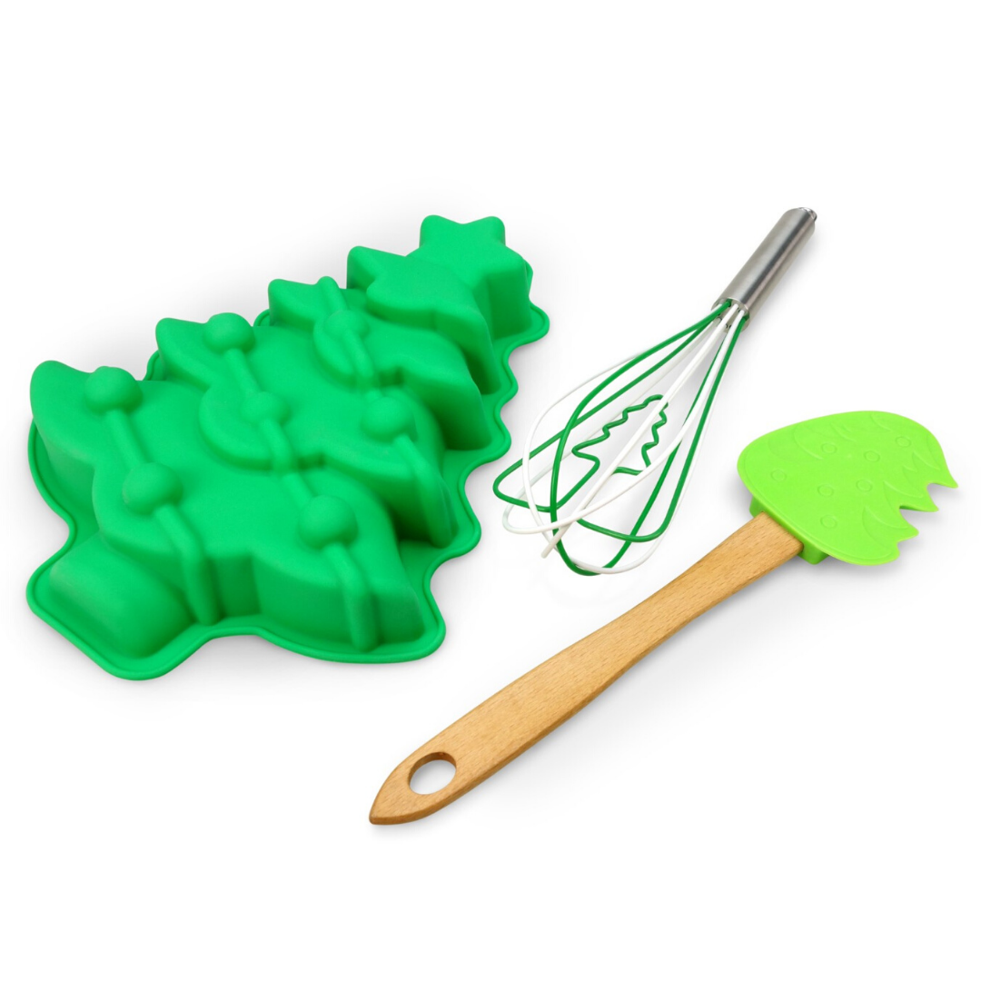 Out of box image of holiday tree cake making set including : 1 silicone tree-shaped cake mold, 1 silicone tree-shaped  spatula and 1 silicone whisk.