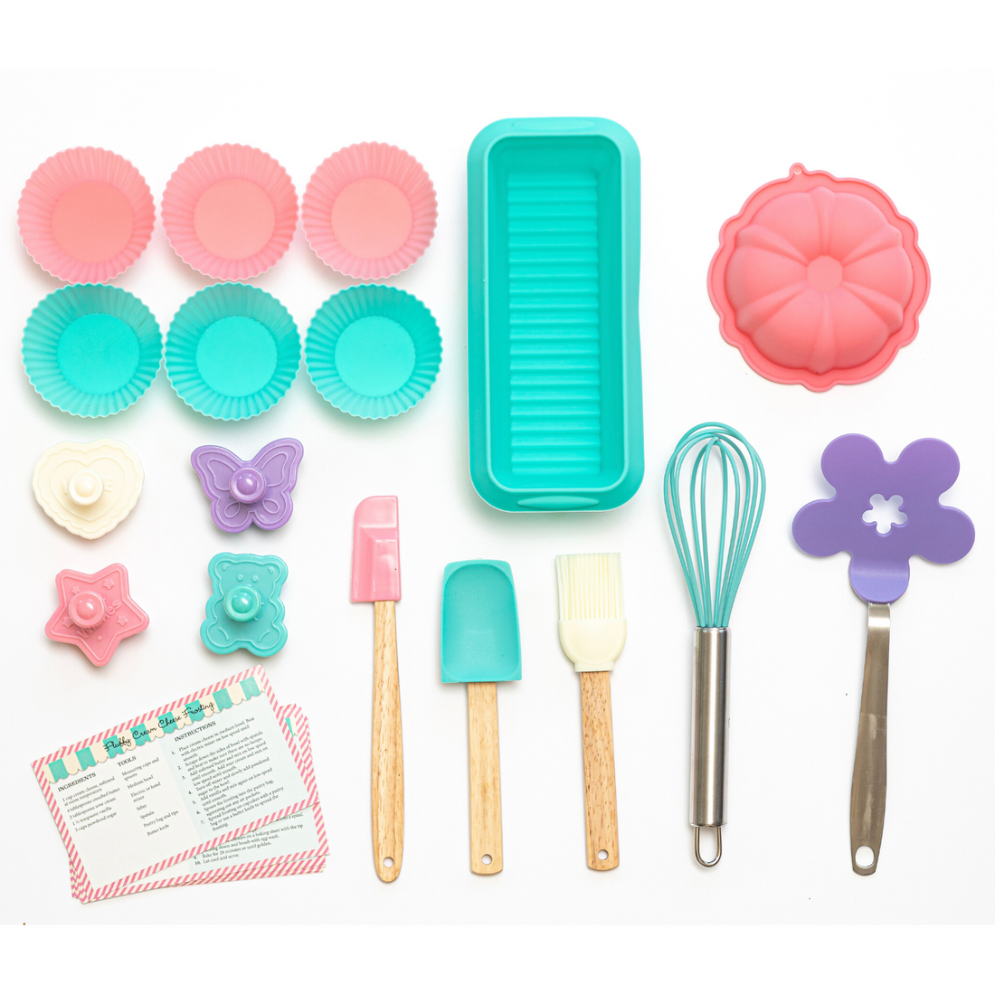 Out of box images of item contained within Bake Shoppe Deluxe Baking Set. 1 silicone fluted cake mold, 1 silicone loaf pan, 6 silicone baking cups, 4 cookie stamps, 1 silicone spatula, 1 silicone  pastry brush, 1 silicone mixing spoon, 1 silicone whisk, 1 flower-shaped cookie flipper and recipes.