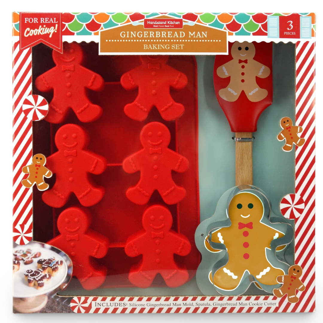 In box image of Gingerbread Man Baking Set containing 1 silicone cupcake mold with 6 gingerbread man shapes, 1  gingerbread man silicone spatula and 1 gingerbread man stainless steel cookie cutter.