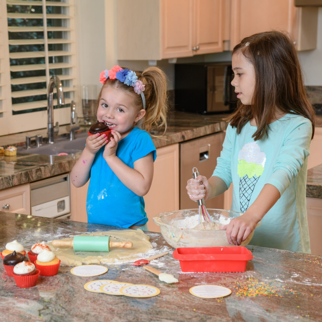 Lifestyle image of kids using Intro to Baking Kids Baking Kit with Tools and Accessories