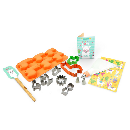 Out of box image of Llama Love Ultimate Baking Party Set including:  1 llama and 1 cactus large stainless steel cookie cutter, 5  mini stainless steel cookie cutters, 1 llama-shaped silicone cupcake  mold, 1 silicone spatula, 1 frosting bag with coupler, ring and 3 tips, a  sticker sheet and recipes.