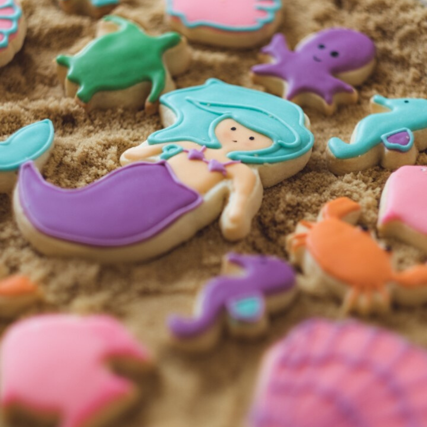 Lifestyle image of a decorated mermaid cookie 