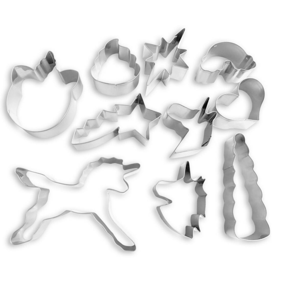 Out of box image of Stainless Steel Rainbow and Unicorn Cookie Cutters Includes: unicorn, shooting star, unicorn horn, star, rainbow, heart, unicorn poop and assorted unicorn head stainless steel cookie cutters.