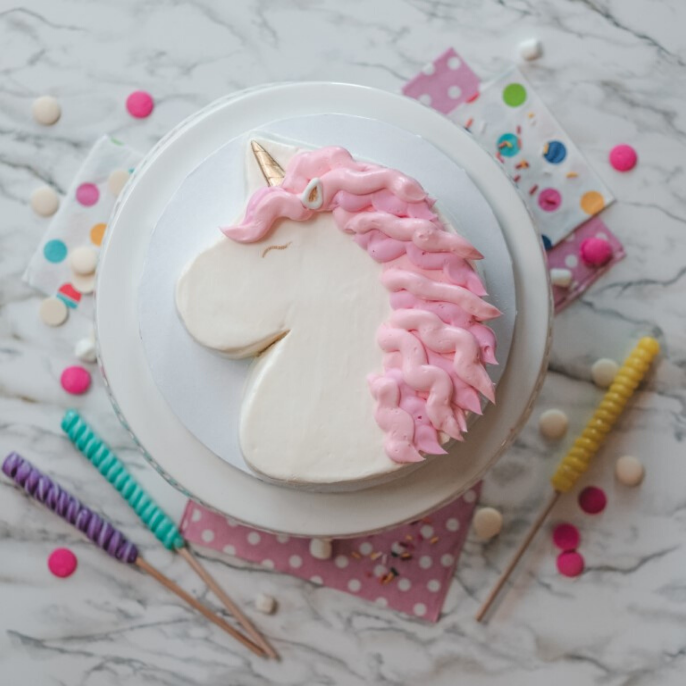 Lifestyle image of large unicorn cake