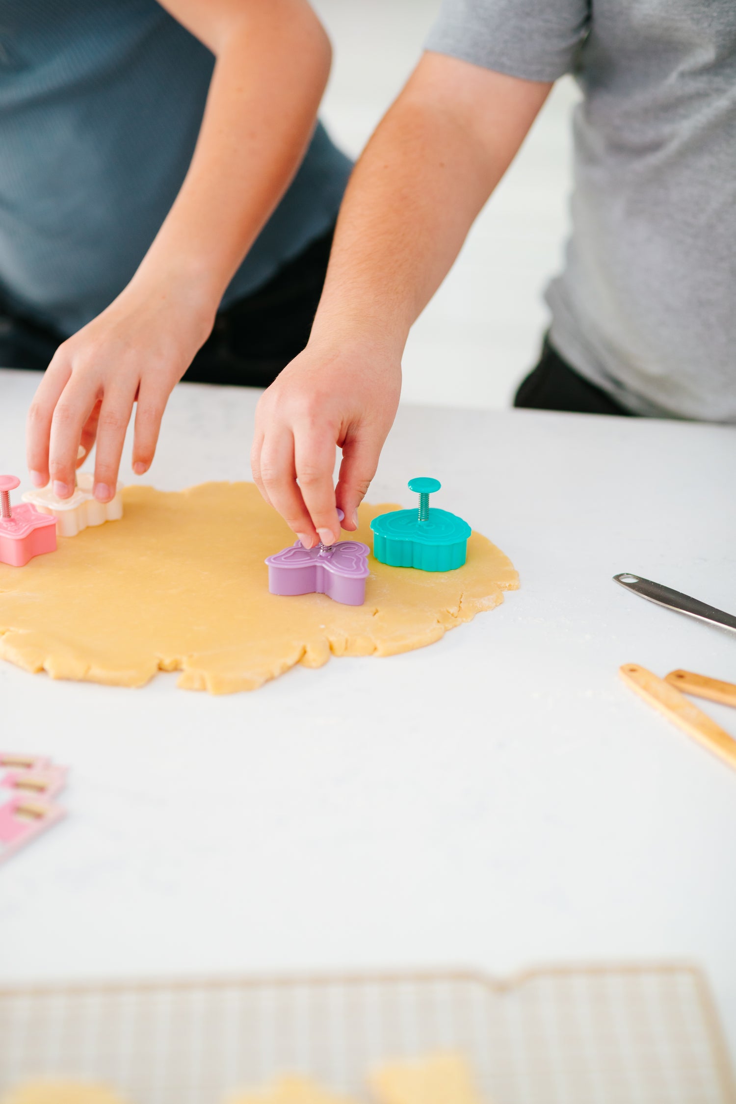 Lifestyle image of kids using the cookie cutters 