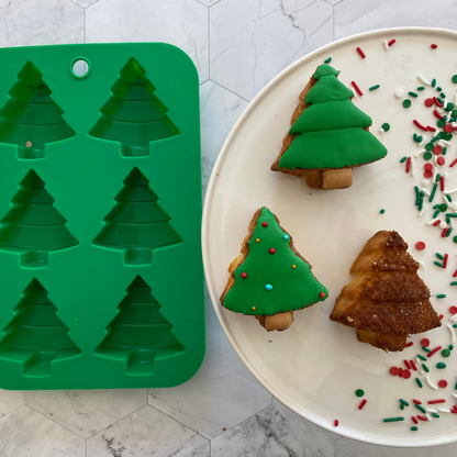 Winter Wonderland Holiday Tree Cupcake Mold with three completed tree cupcakes
